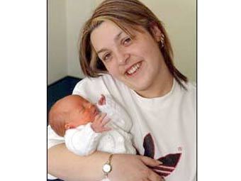 Элен Смитэм с новорожденным
