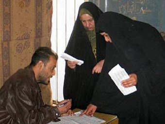 Голосование на выборах в Ираке. Фото Reuters