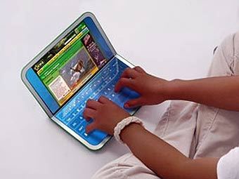 OLPC XO-2.    laptopmag.com 