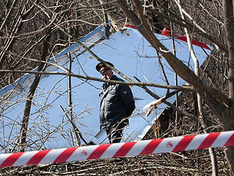 На месте катастрофы Ту-154 под Смоленском. Архивное фото ©AFP